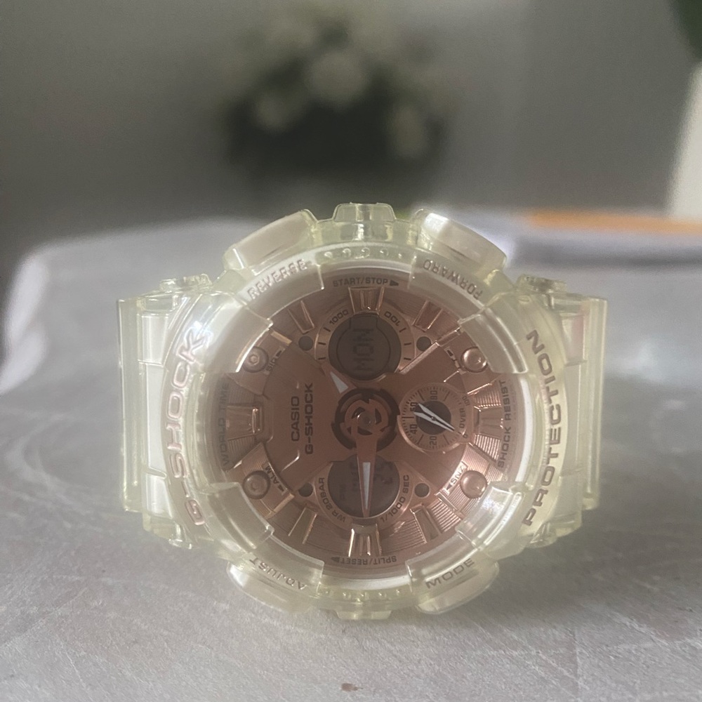 Casio G- shock rose gold watch water resistant.